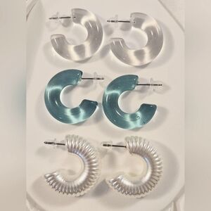 Three Pairs of Acrylic Hoop Earrings in Clear, Aqua, and Pearl